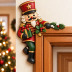 "Peekaboo" Christmas decoration for the door frame corner